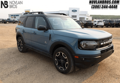 A blue 2024 Ford Bronco Sport Outer Banks for sale at the Novlan Bros dealership in Saskatchewan.