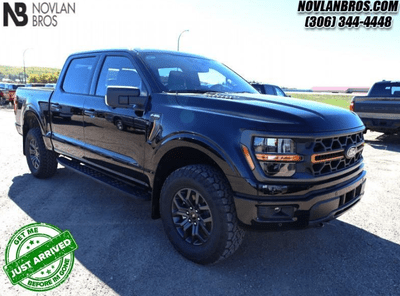 A black 2024 Ford F-150 Tremor for sale at the Novlan Bros dealership in Saskatchewan.