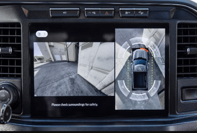 A close-up of the 2024 Ford F-250 Super Duty's camera system, with a bird's-eye view of the truck visible on the cabin's touchscreen.