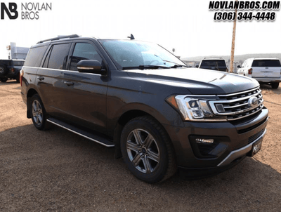 A grey 2018 Ford Expedition XLT for sale at the Novlan Bros dealership in Saskatchewan.