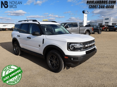 A white 2024 Ford Bronco Sport Big Bend for sale at the Novlan Bros dealership in Saskatchewan.