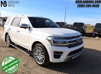 A white 2022 Ford Expedition Platinum for sale at the Novlan Bros dealership in Saskatchewan.