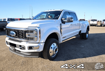 A white 2024 Ford F-450 Platinum for sale at the Novlan Bros dealership in Saskatchewan.