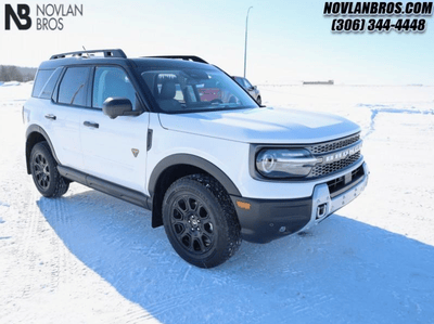 A white 2025 Ford Bronco Sport Badlands for sale at the Novlan Bros dealership in Saskatchewan.