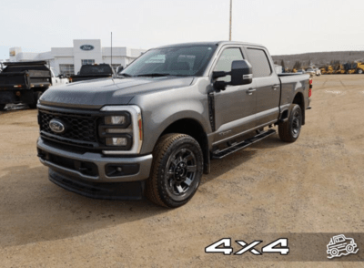 A grey 2023 Ford F-350 Lariat for sale at the Novlan Bros dealership in Saskatchewan.