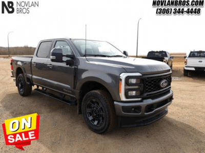 A black 2023 Ford F-350 Super Duty Lariat for sale at the Novlan Bros dealership in Saskatchewan.