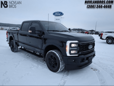 A black 2023 Ford F-350 XLT Super Duty for sale at the Novlan Bros dealership in Saskatchewan.