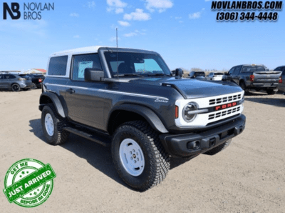 A grey 2024 Ford Bronco Heritage Edition for sale at the Novlan Bros dealership in Saskatchewan.