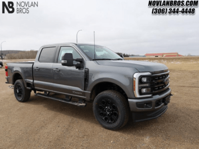 A grey 2024 Ford F-350 Lariat Super Duty for sale at the Novlan Bros dealership in Saskatchewan.