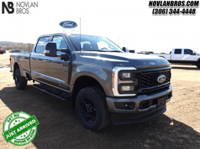 A grey 2024 Ford F-350 XLT Super Duty for sale at the Novlan Bros dealership in Saskatchewan.