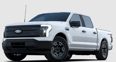 A white 2024 Ford F-150 Lightning Platinum posed against a white background.