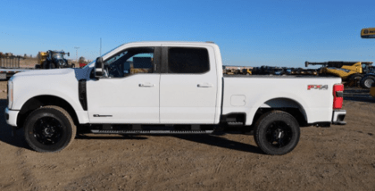 A white 2023 Ford F-250 XLT Super Duty parked at the Novlan Bros dealership.