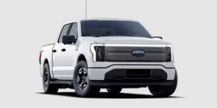 A white 2023 Ford F-150 Lightning posed against a white background.
