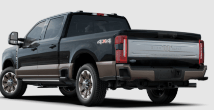 A black 2023 Ford F-250 King Ranch Super Duty parked against a white background and shown from the rear.