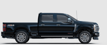 A black 2023 Ford F-250 Limited Super Duty posed against a white background and shown from the side.