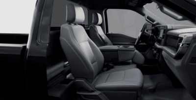 Interior view of the 2023 Ford F-250 XL, with the seats, dashboard, and steering wheel on display.
