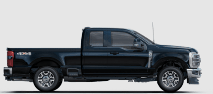 A black 2023 Ford F-350 Lariat Super Duty posed against a white background and shown from the side.