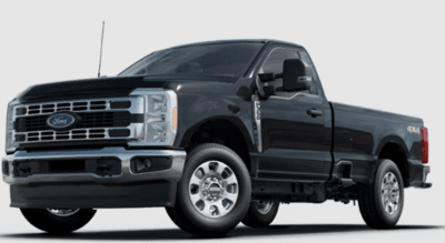 A black 2023 Ford F-350 XLT Super Duty parked against a white background,