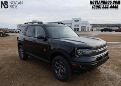 A black 2024 Ford Bronco Sport Badlands parked at the Novlan Bros Ford dealership in Saskatchewan.