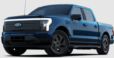 A blue 2023 Ford F-150 Lightning Lariat posed against a white background.