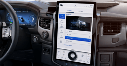 Close-up of the 2023 Ford F-150 Lightning's SYNC 4 touchscreen, displaying various towing and payload information.