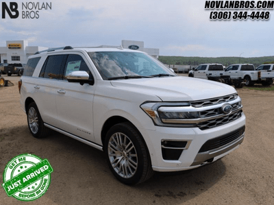 A white 2024 Ford Expedition Platinum for sale at the Novlan Bros dealership in Saskatchewan.