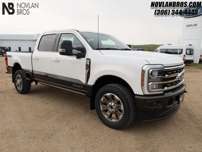 A white 2024 Ford F-350 King Ranch for sale at the Novlan Bros dealership in Lloydminster, SK