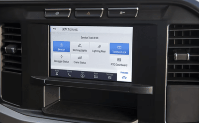 Close-up of the 2024 Ford F-350 Limited's SYNC 4 console, with the Upfit Integration System on display.