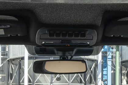 Close-up of the 2024 Ford F-350's overhead console, with various upfitter switches installed.