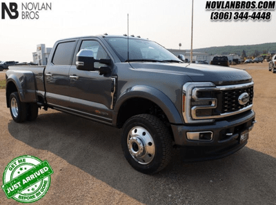 A grey 2024 Ford F-450 Platinum for sale at the Novlan Bros dealership in Saskatchewan.