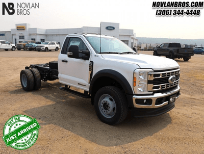 A white 2024 Ford F-600 XLT for sale at the Novlan Bros dealership in Saskatchewan