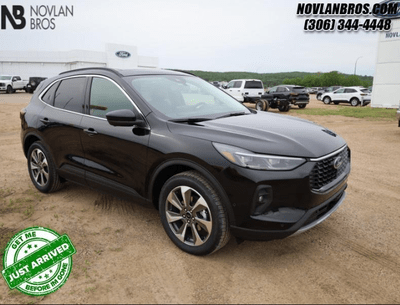 A black 2024 Ford Escape Platinum for sale at the Novlan Bros dealership in Saskatchewan.