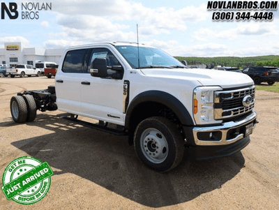 A white 2024 Ford F-550 XLT for sale at the Novlan Bros dealership in Saskatchewan.