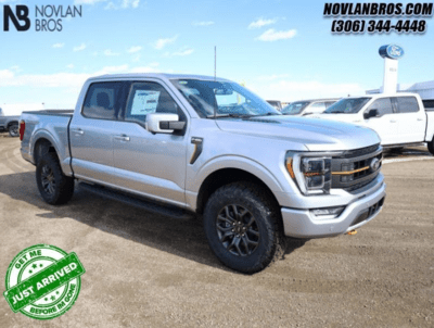 A silver 2023 Ford F-150 Tremor parked at the Novlan Bros dealership in Saskatchewan.