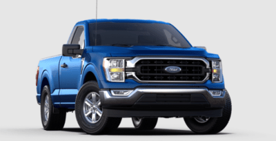 A blue 2023 Ford F-150 XLT truck parked against a white background.
