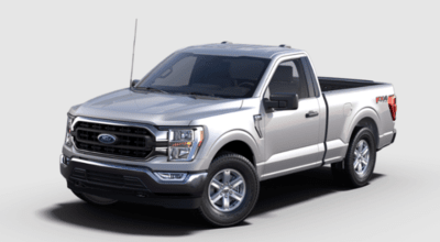 A silver 2023 Ford F-159 XLT equipped with the FX$ Package and posed against a white background.