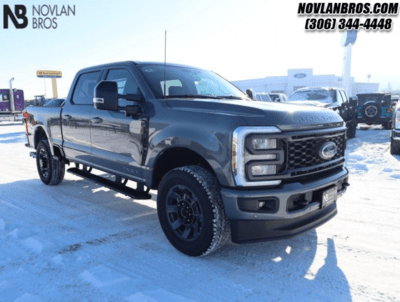 A black 2024 Ford F-350 Super Duty Lariat parked at the Novlan Bros dealership in Saskatchewan.