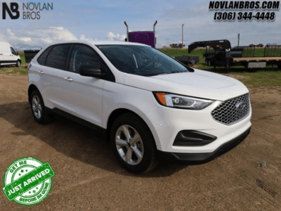 A white 2024 Ford Edge SE for sale at the Novlan Bros dealership in Saskatchewan.