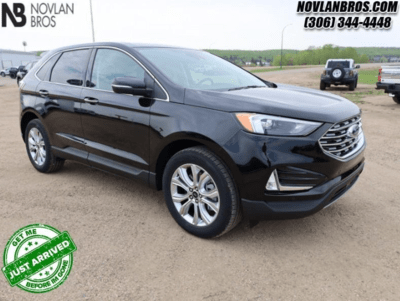 A black 2024 Ford Edge Titanium for sale at the Novlan Bros dealership in Saskatchewan.