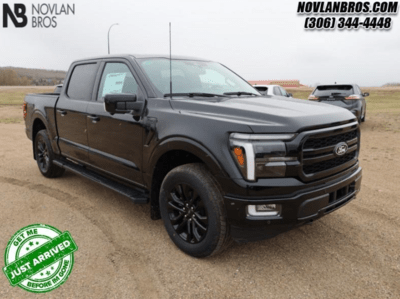 A black 2024 Ford F-150 Lariat for sale at the Novlan Bros dealership in Saskatchewan.