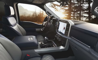 Interior view of the 2023 Ford F-150 Limited, with leather seats and SYNC 4 screen visible.
