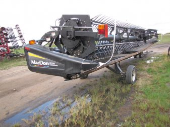 2011 MACDON FD70 JD Adapter - Image 1